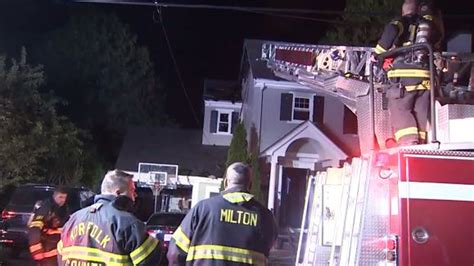Firefighters battle early morning house fire in Milton